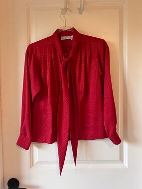 Red tie-neck blouse